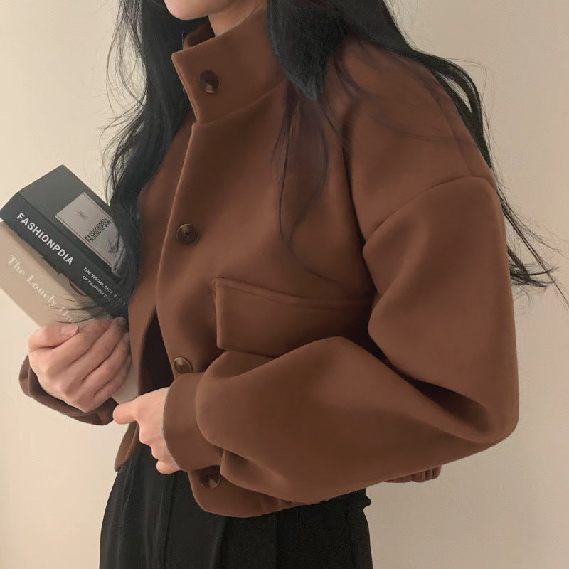 Damejakke laget av høykvalitets ullblanding med casual lommer og oversized snitt