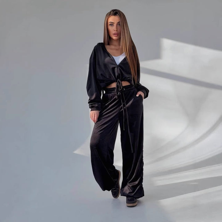Kvinnelig casual hette sett med langermet topp og brede joggers Skjora