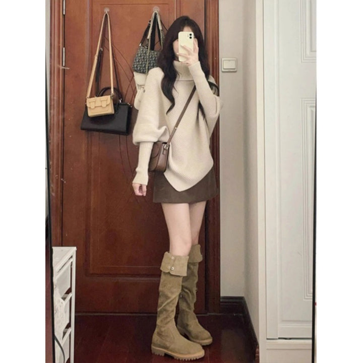 Kvinnes oversized genser med asymmetrisk hem Skjora