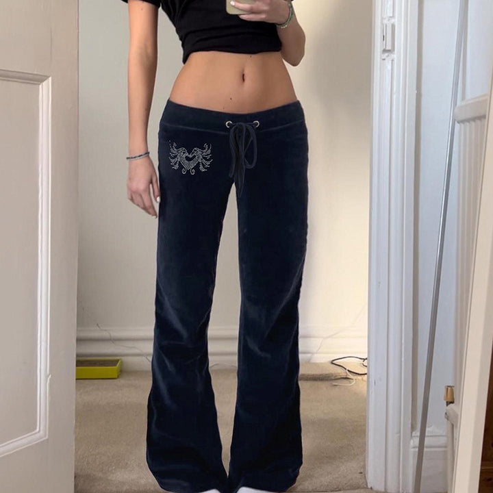 Dame-sweatpants i leken flared-design med trendy broderier Skjora