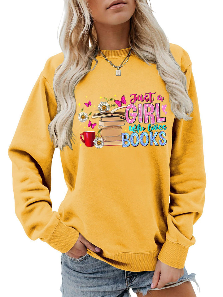 Dame sweatshirt med iøynefallende bokmotiv og ledig passform Skjora