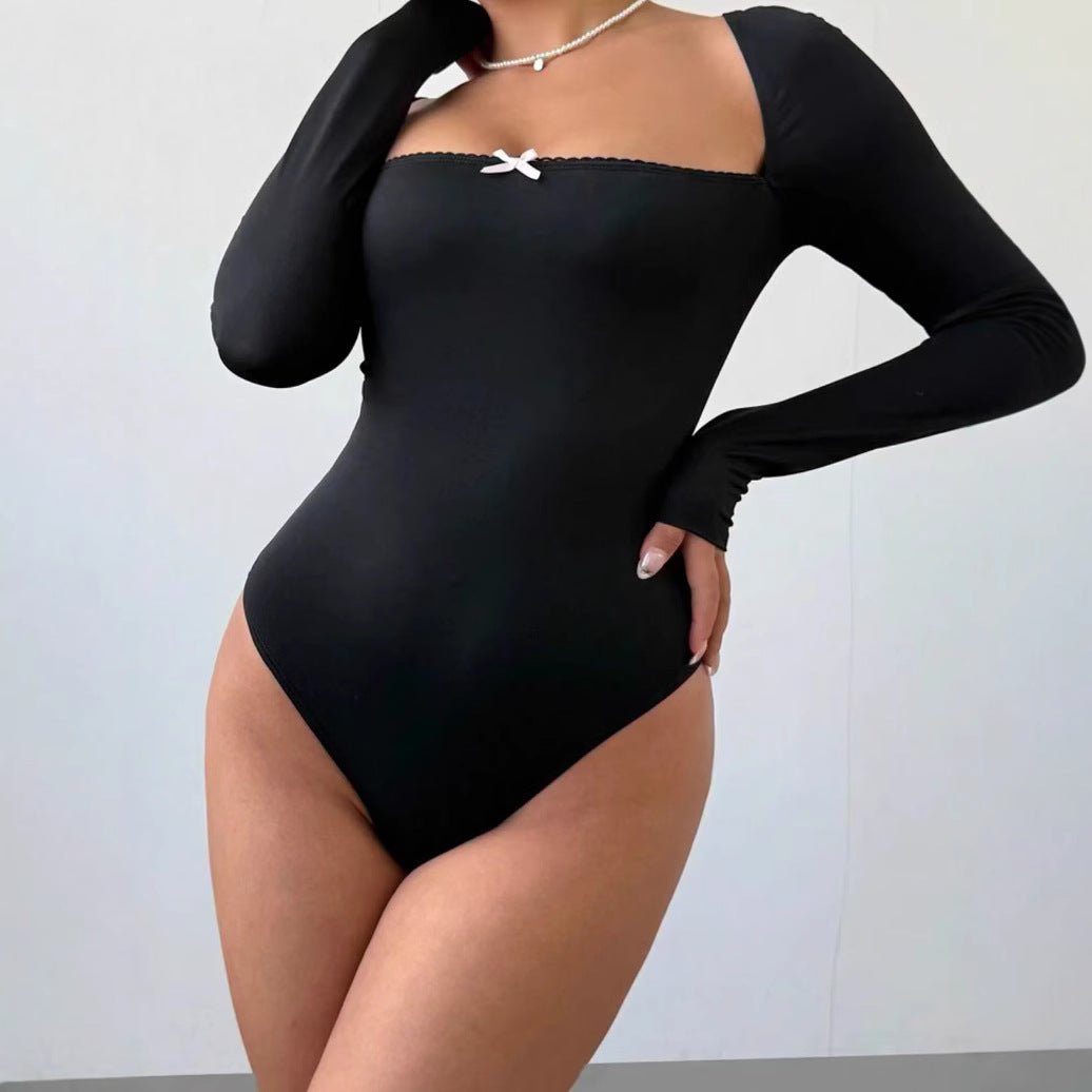 Dame Figurtiltende Langermet Bodysuit med elegant utringning Skjora