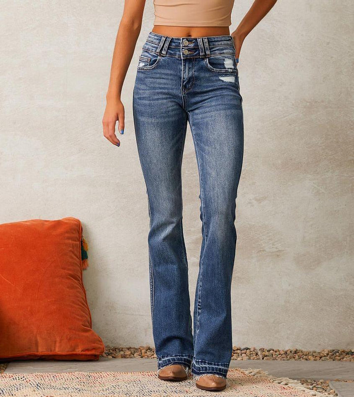Kvinnelige flared jeans med høy midje og fashionable ødelagt effekt Skjora