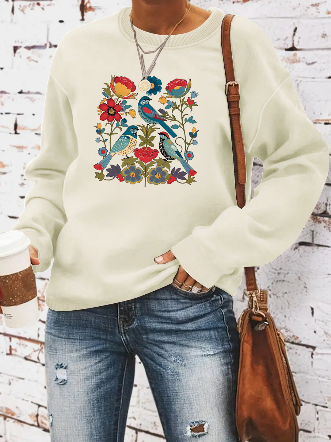 Damegenser med blomsterfuglmotiv og casual snitt Skjora