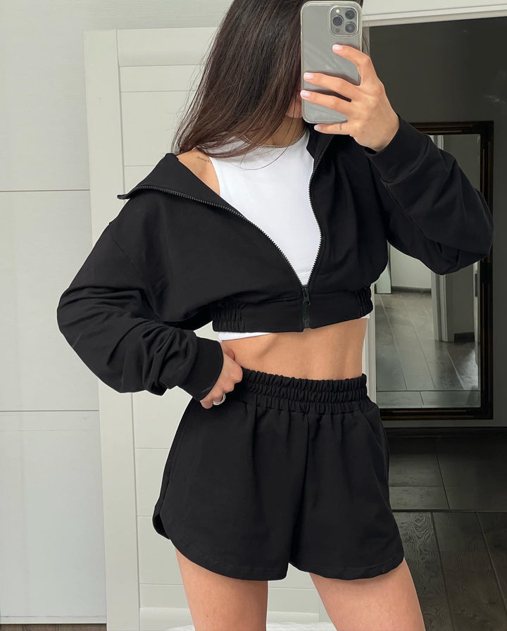 Dames sportieve korte jumpsuit set met rits en elastische tailleband Skjora