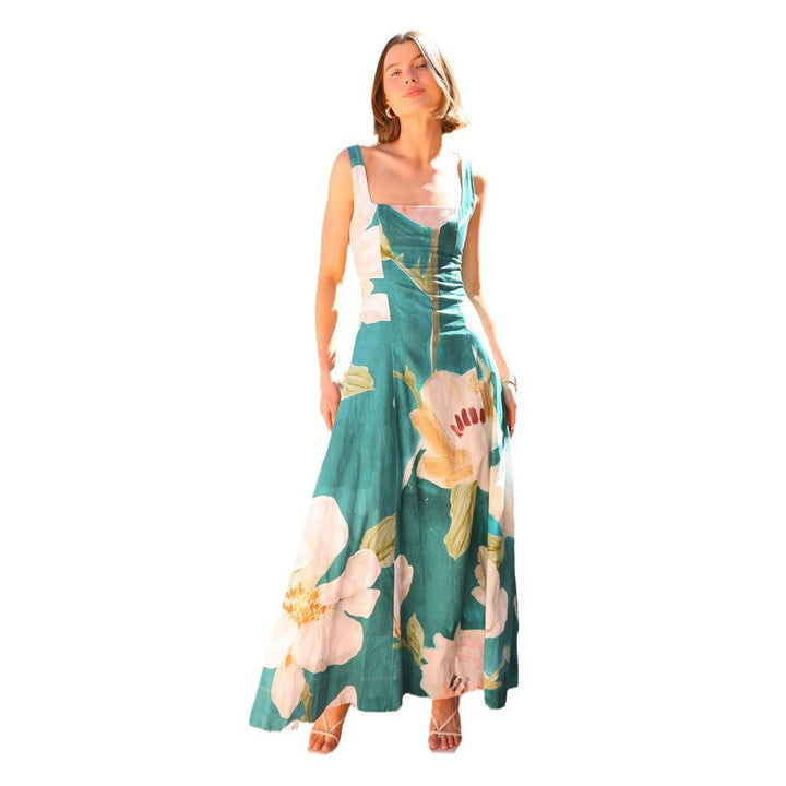 Kvinnens maxi kjole med blomsterdesign og tettsittende silhuett