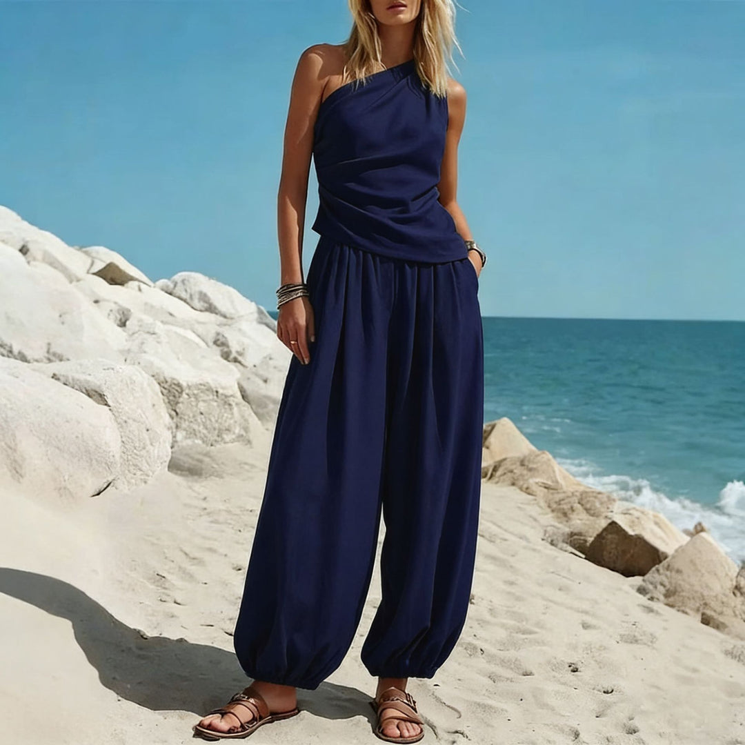 Damer Elegant Einteiler-Outfit med Flytende Snitt og One-Shoulder-Design Skjora