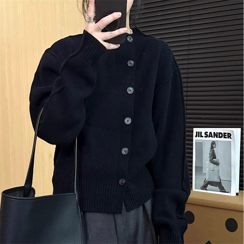 Dame cardigan med stilige knappelukking og voluminøse ermer Skjora