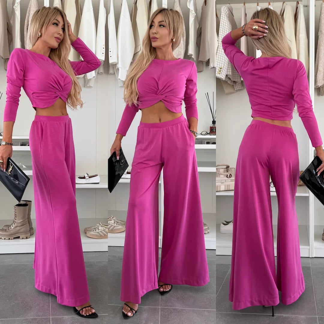 Kvinnes elegant fritidssett med crop top og vide bukser