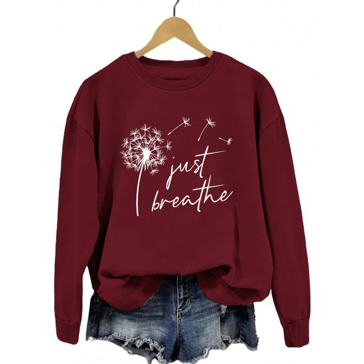 Dame sweatshirt med inspirerende løvetannmotiv Skjora