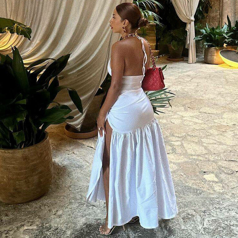 Dame Maxi-kjole med elegant omslagsdesign og sidedelt slit Skjora