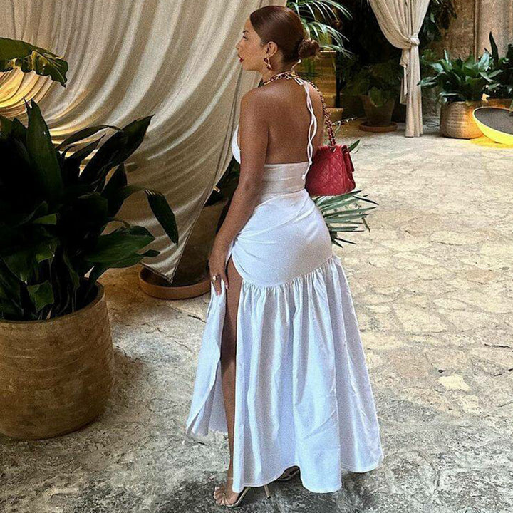 Dame Maxi-kjole med elegant omslagsdesign og sidedelt slit Skjora