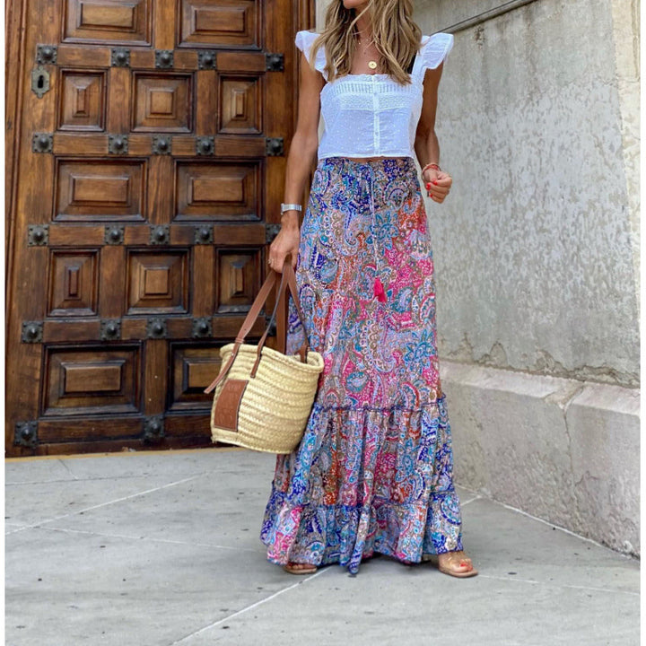 Women's maxi dress with cheerful pattern Skjora