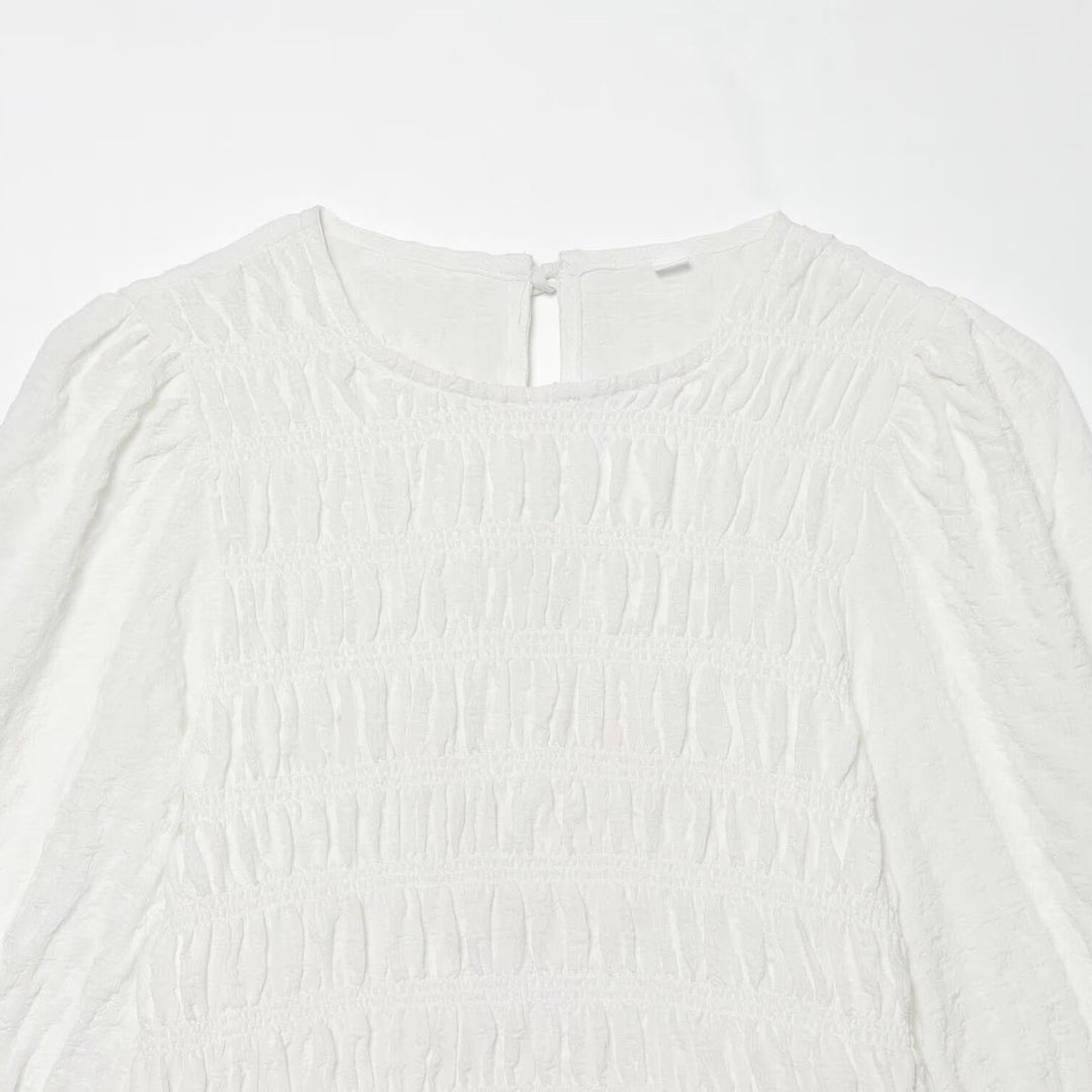 Damebluse med volanger og ballongformede ermer Skjora