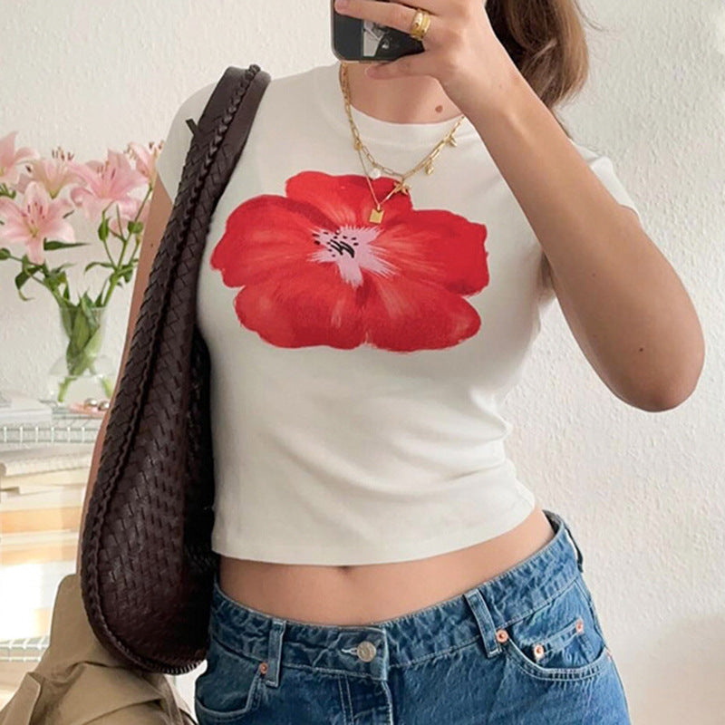 Dame Crop-T-skjorte med blomstermønster Skjora