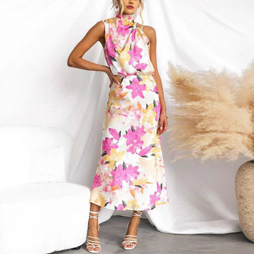 Kvinnens maxi kjole med asymmetrisk topp og blomsterprint Skjora