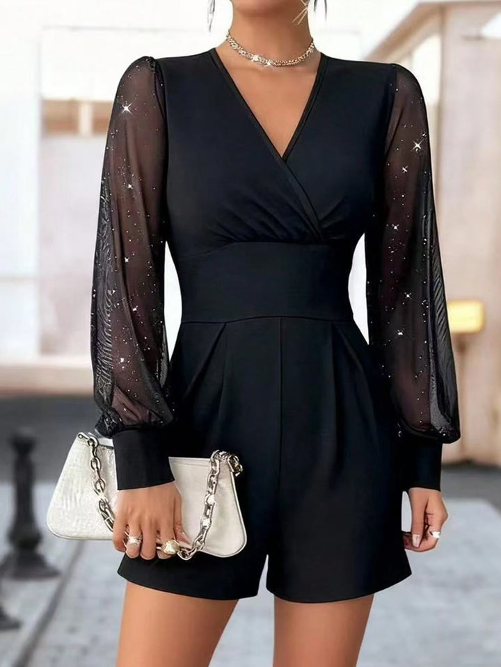 Dame elegant jumpsuit med transparente puffermer og V-hals Skjora