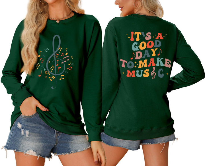 Dame sweatshirt med musikalsk motiv og kreativ skrift Skjora