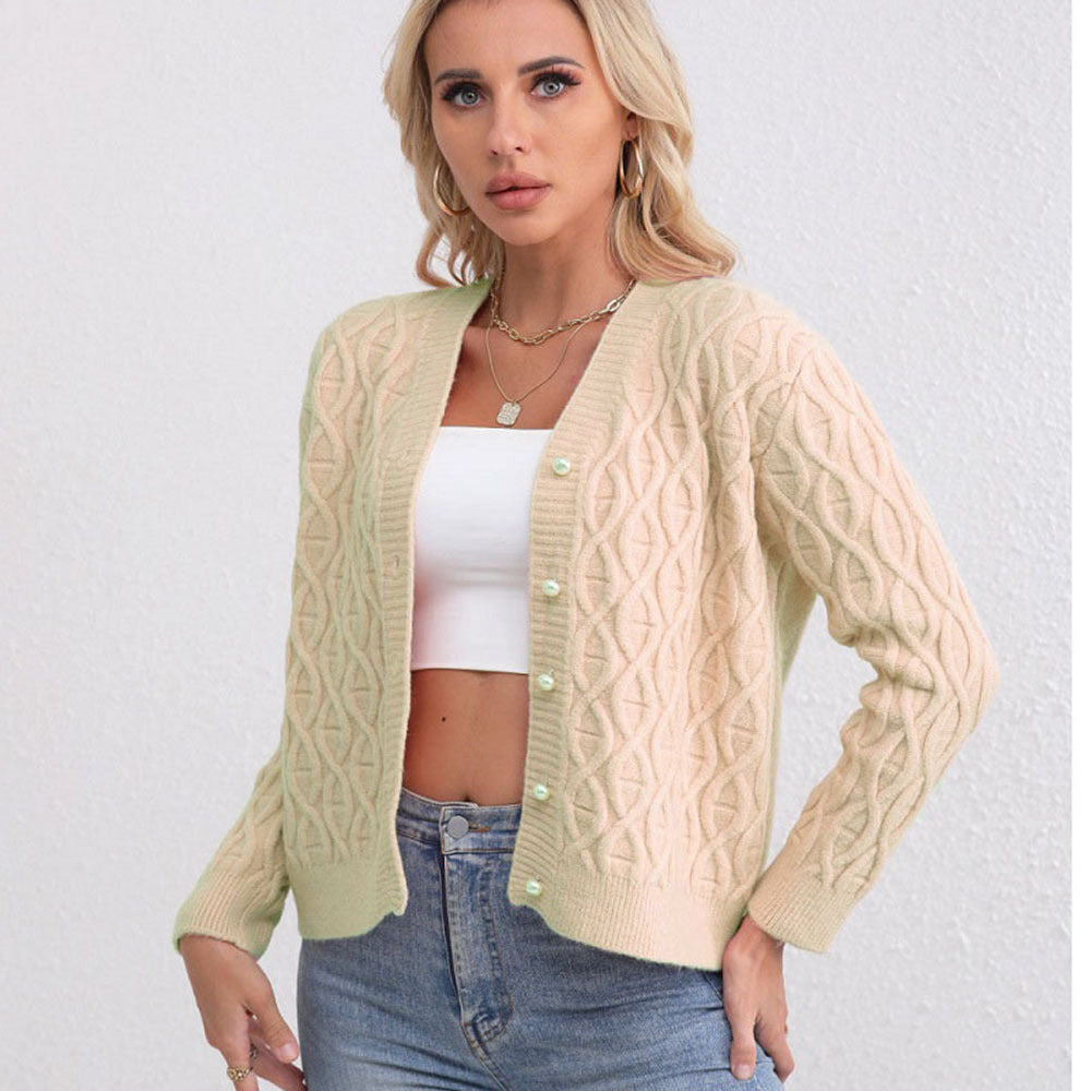 Women's designer cardigan with cable pattern and soft colors Skjora
