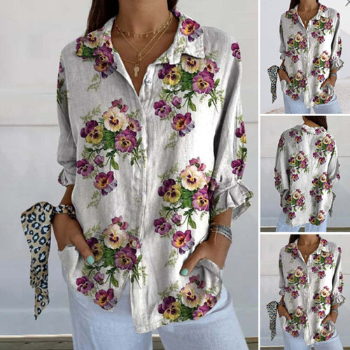 Damebluse i blomsterdesign med skjult knappelukking Skjora