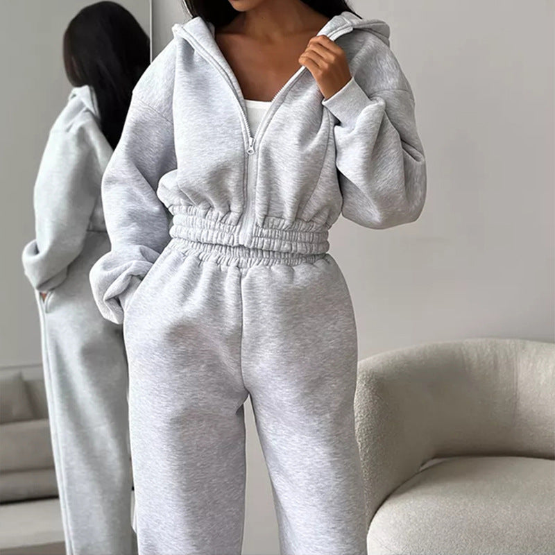 Kvinners sporty fleece jumpsuit med hette og løs passform Skjora