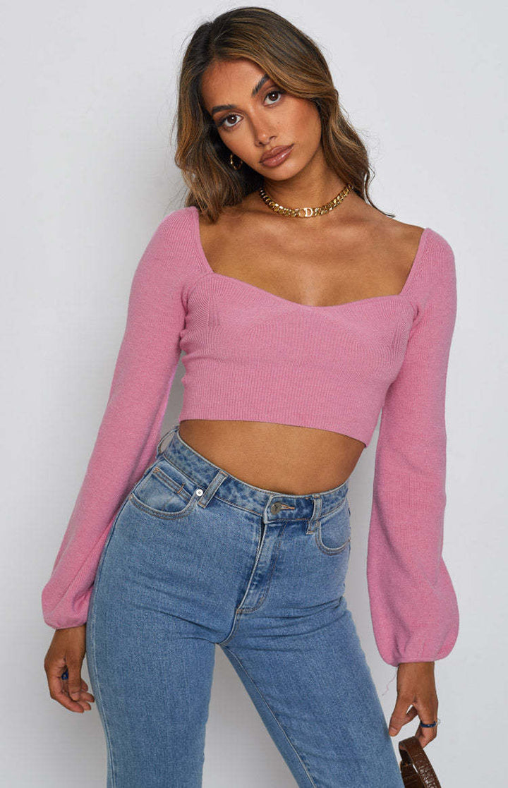 Damer elegant cropped topp med stilfull ribbestruktur og vid erme Skjora