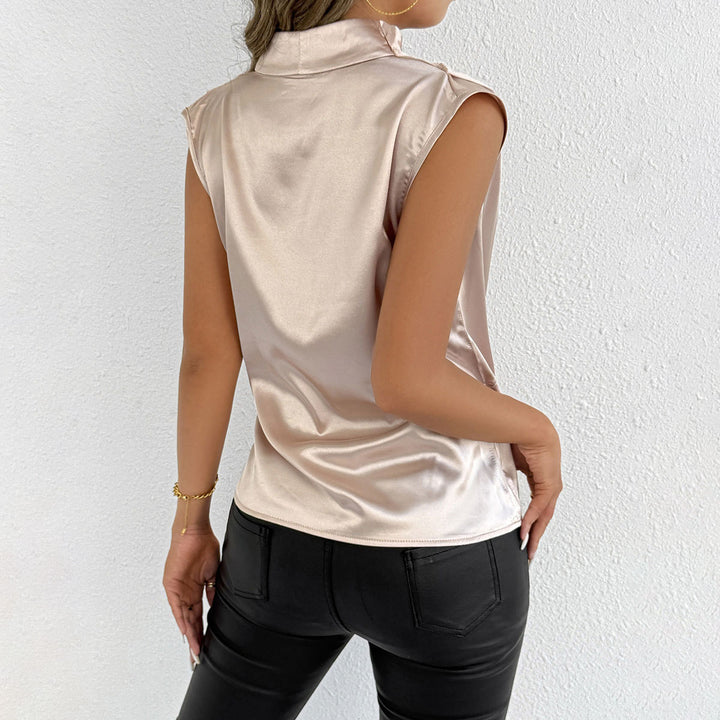 Dame Satin-vriddet topp med elegant snitt og moderne detaljer Skjora