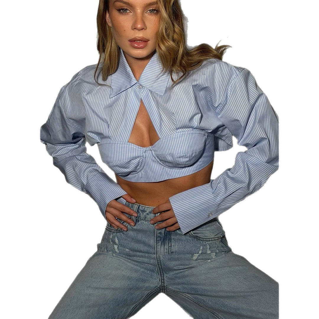 Kvinnens avkuttede skjorte bluse med innovativ design og voluminøse ermer Skjora