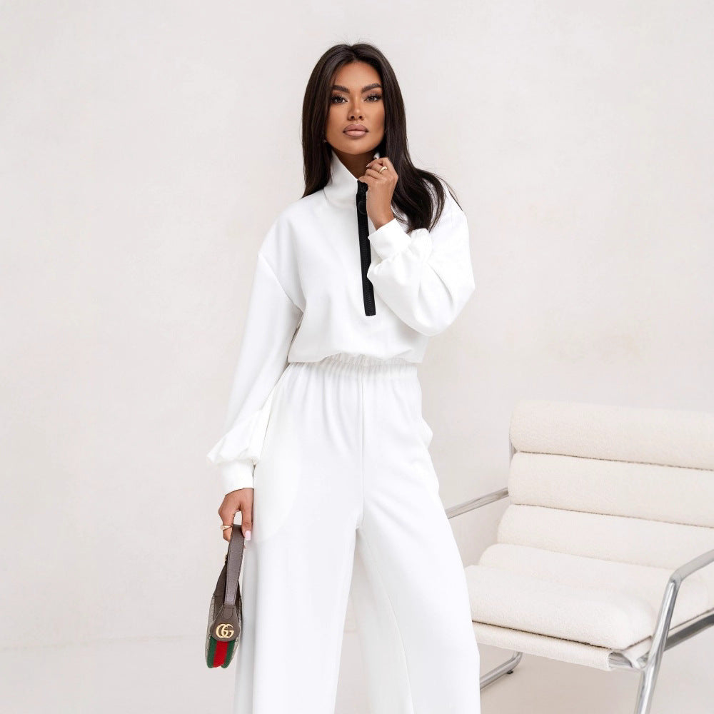 Damer sporty jumpsuit med høy krage og moderne glidelås Skjora