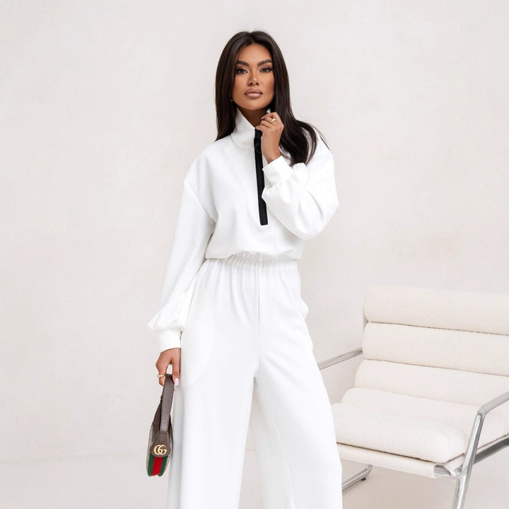 Damer sporty jumpsuit med høy krage og moderne glidelås Skjora