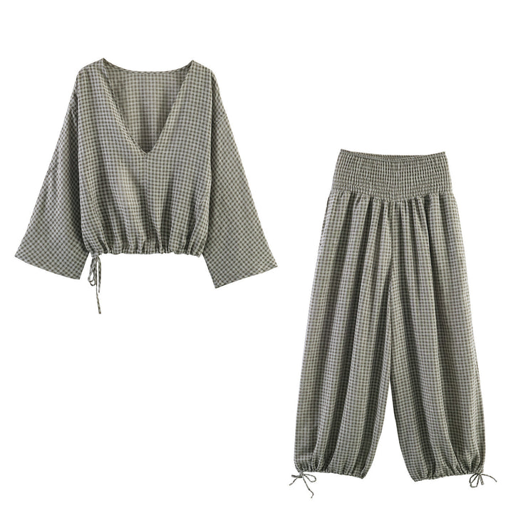 Damer casual bluse med vid V-hals og elastisk kant Skjora