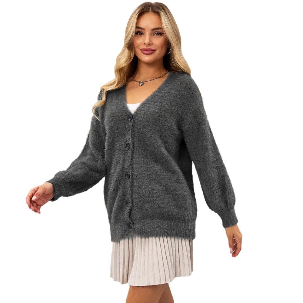 Kvinnens koselige cardigan med asymmetrisk snitt og knappeåpning Skjora
