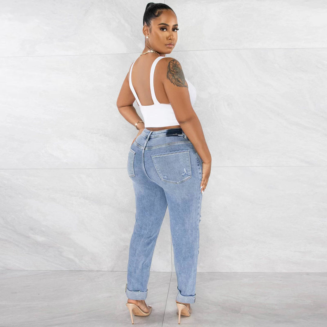 Kvinnenes høyhals boyfriend-jeans med frynsehem og casual brukt utseende Skjora