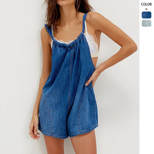 Kvinnenes denim jumpsuit med leken cut og justerbare stropper