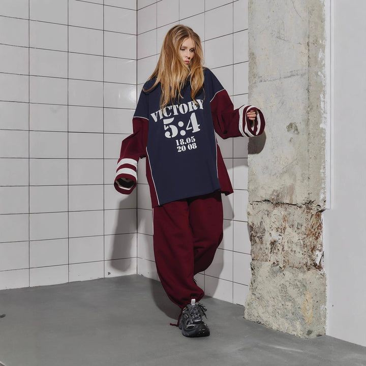 Kvinne Oversized Treningsdrakt med Grafisk Trykk og Bred Bukse Skjora