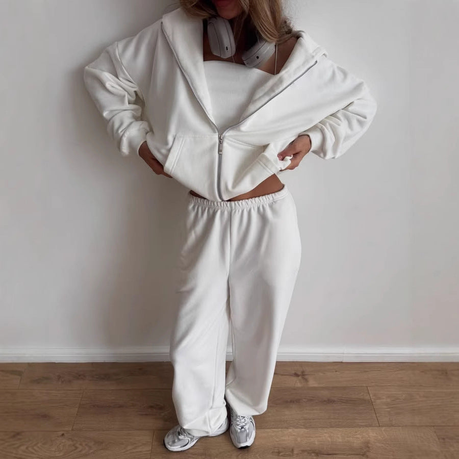 Kvinnelig avslappet fleece treningsdrakt med integrert glidelås og vide bukser Skjora