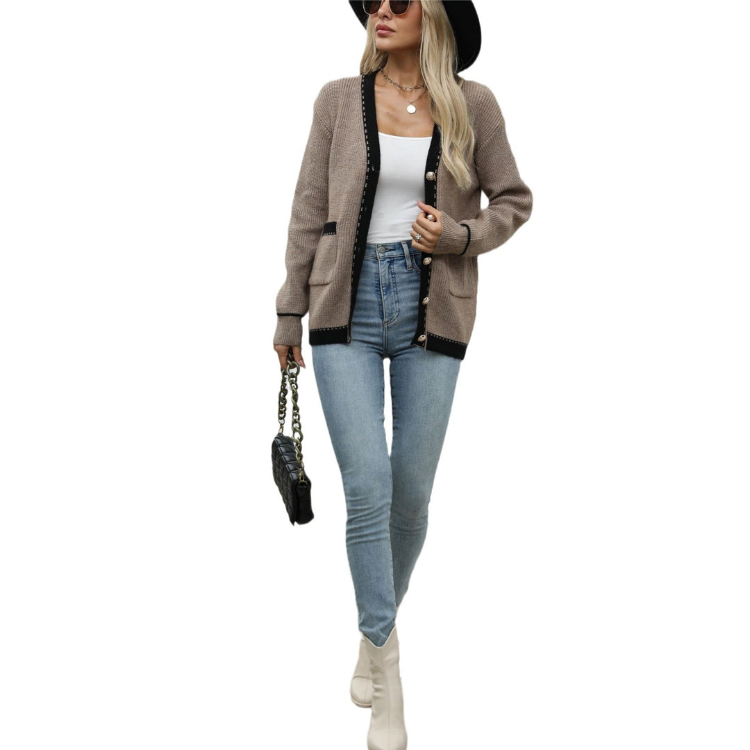 Dame cardigan med teksturert mønster og detaljer med gullknapper Skjora