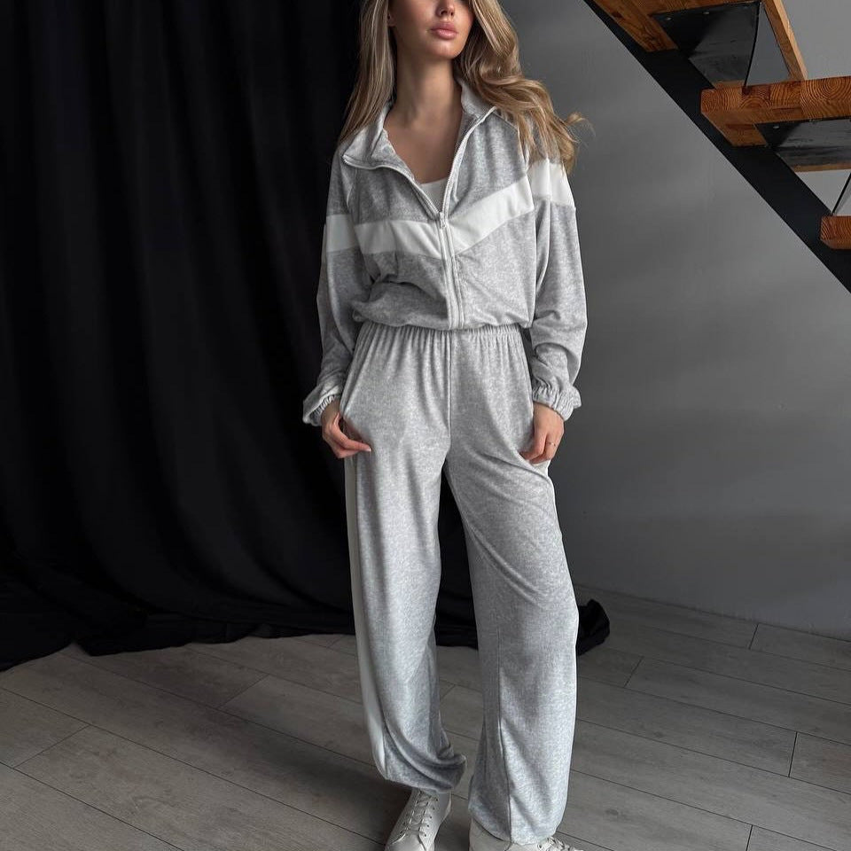 Women's sporty fleece jumpsuit with high collar and contrasting inserts Skjora