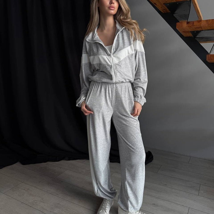Women's sporty fleece jumpsuit with high collar and contrasting inserts Skjora