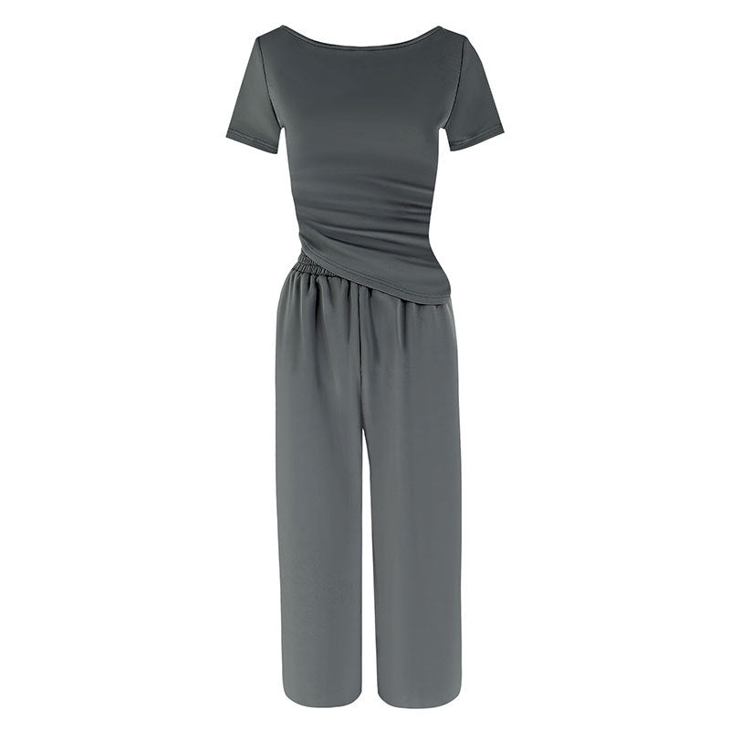 Dame jumpsuit med asymmetrisk snitt og vidbenet design Skjora
