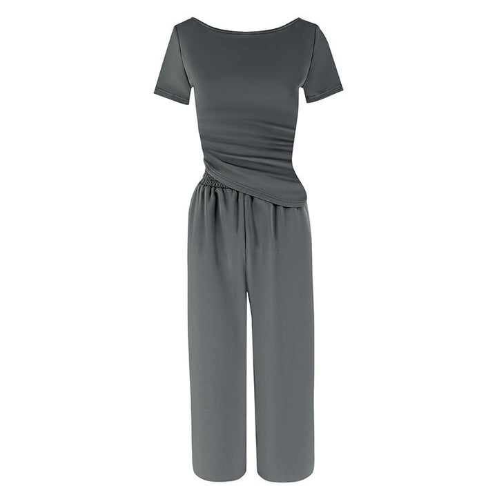 Dame jumpsuit med asymmetrisk snitt og vidbenet design Skjora
