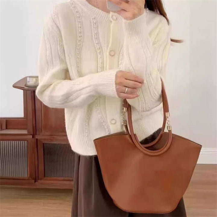 Dame cardigan med elegante perledetaljer og klassisk snitt Skjora