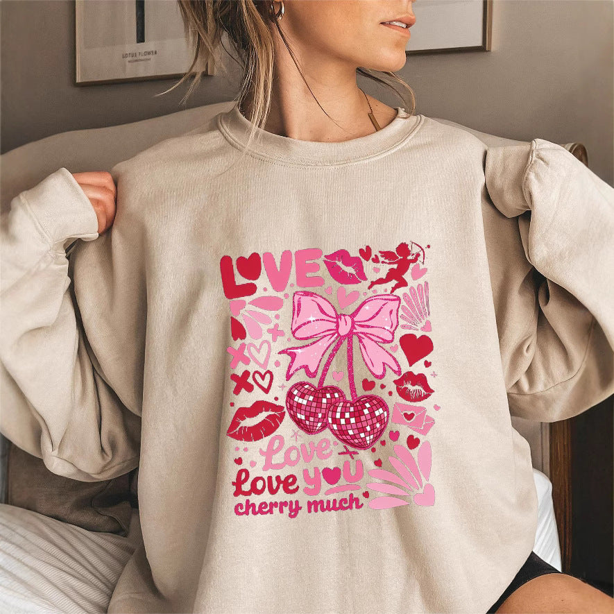 Dame sweatshirt med voluminøse ermer og lekent kirsebærmotif Skjora