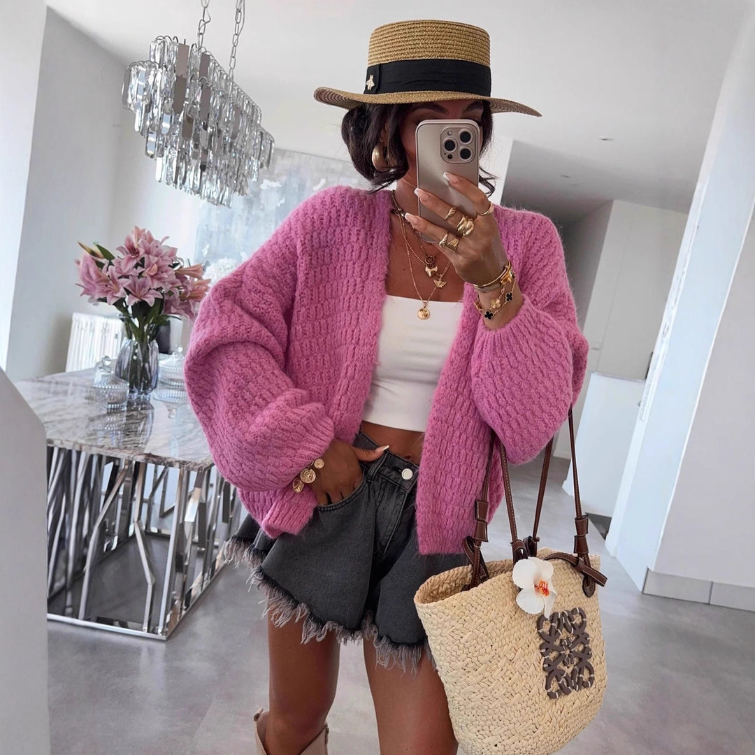 Kvinnes chunky strikk cardigan med voluminøse ermer og åpen front Skjora
