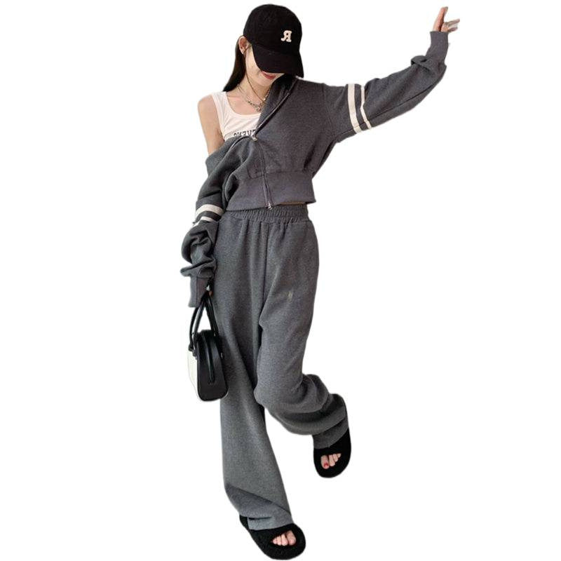 Kvinne sporty hettegenser og joggebukse sett med sporty glidelås og bred passform Skjora