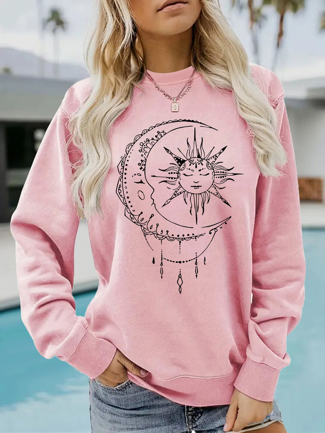 Dames sweatshirt med kunstnerisk sol- og måne-design Skjora