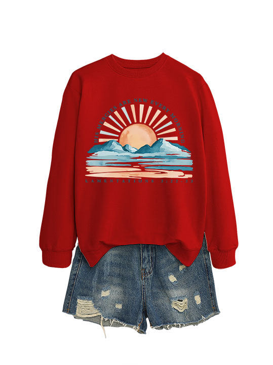 Kvinne sweatshirt med inspirerende soloppgang design og avslappet passform Skjora