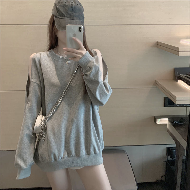 Kvinnes uformell oversized genser med åpne skuldre og moderne design