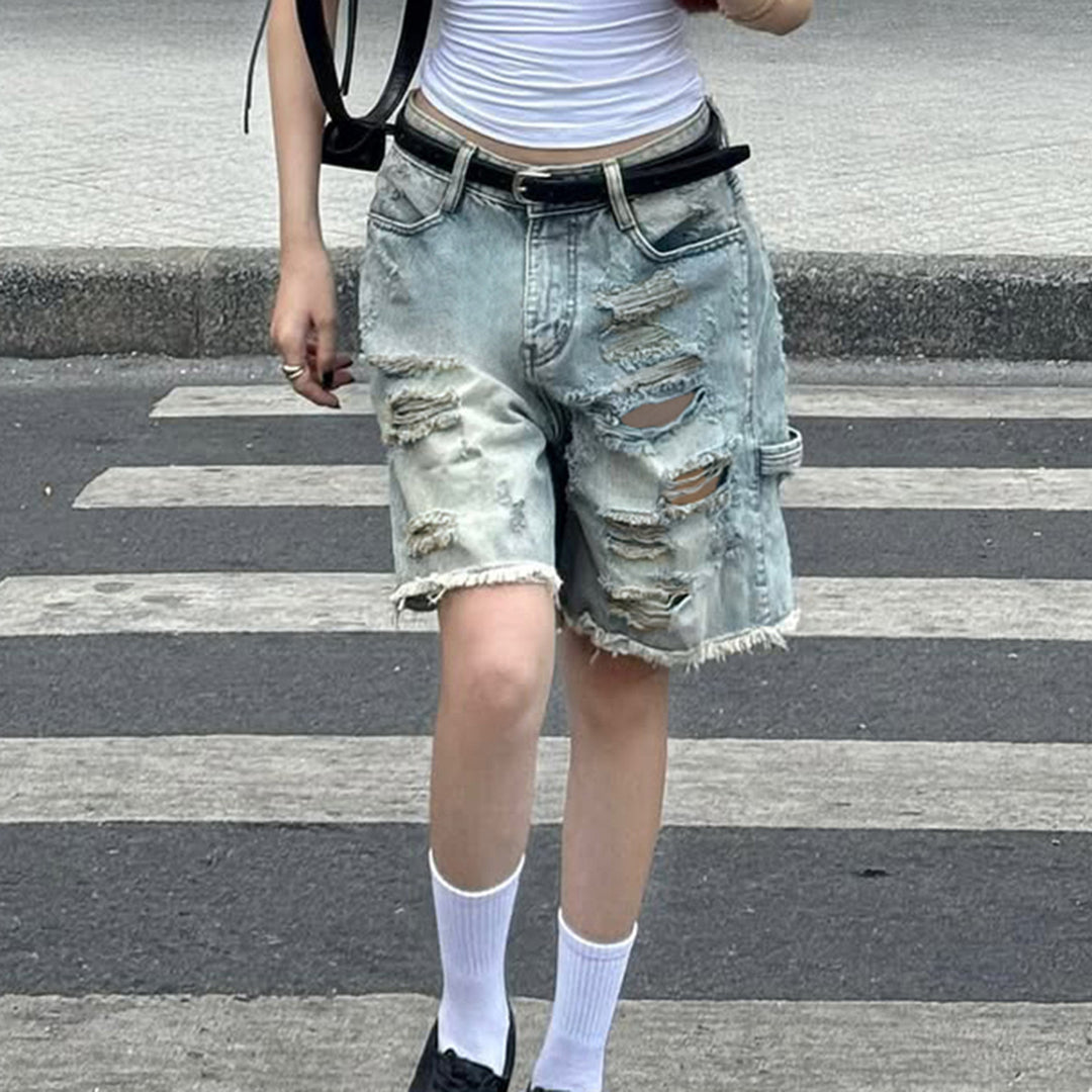 Dame Z ødelagte denimshorts med høy midje og flikete kanter Skjora