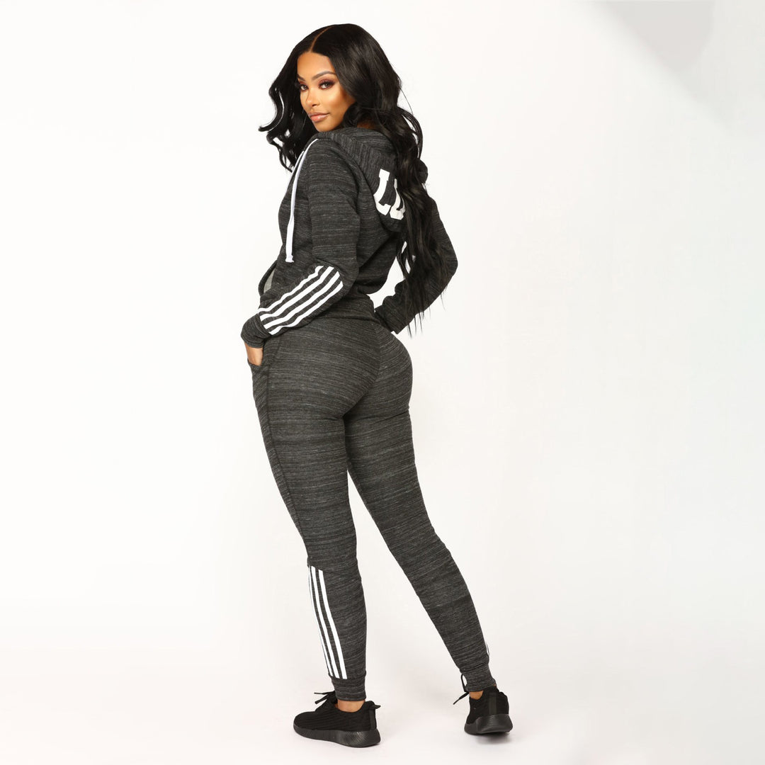 Dame sporty fleece joggedress med sidestriper Skjora